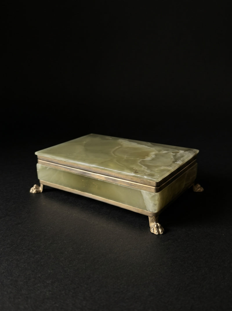 Vintage olive green decorative stone box with brass-toned trim and claw feet