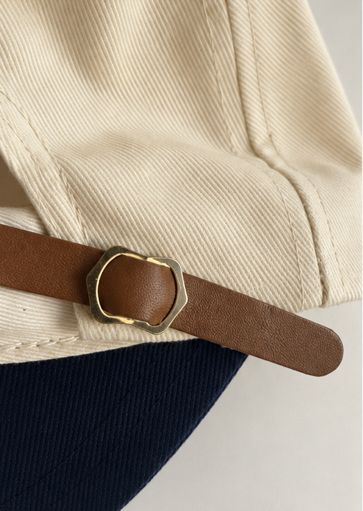 Corrected detail of strap and buckle