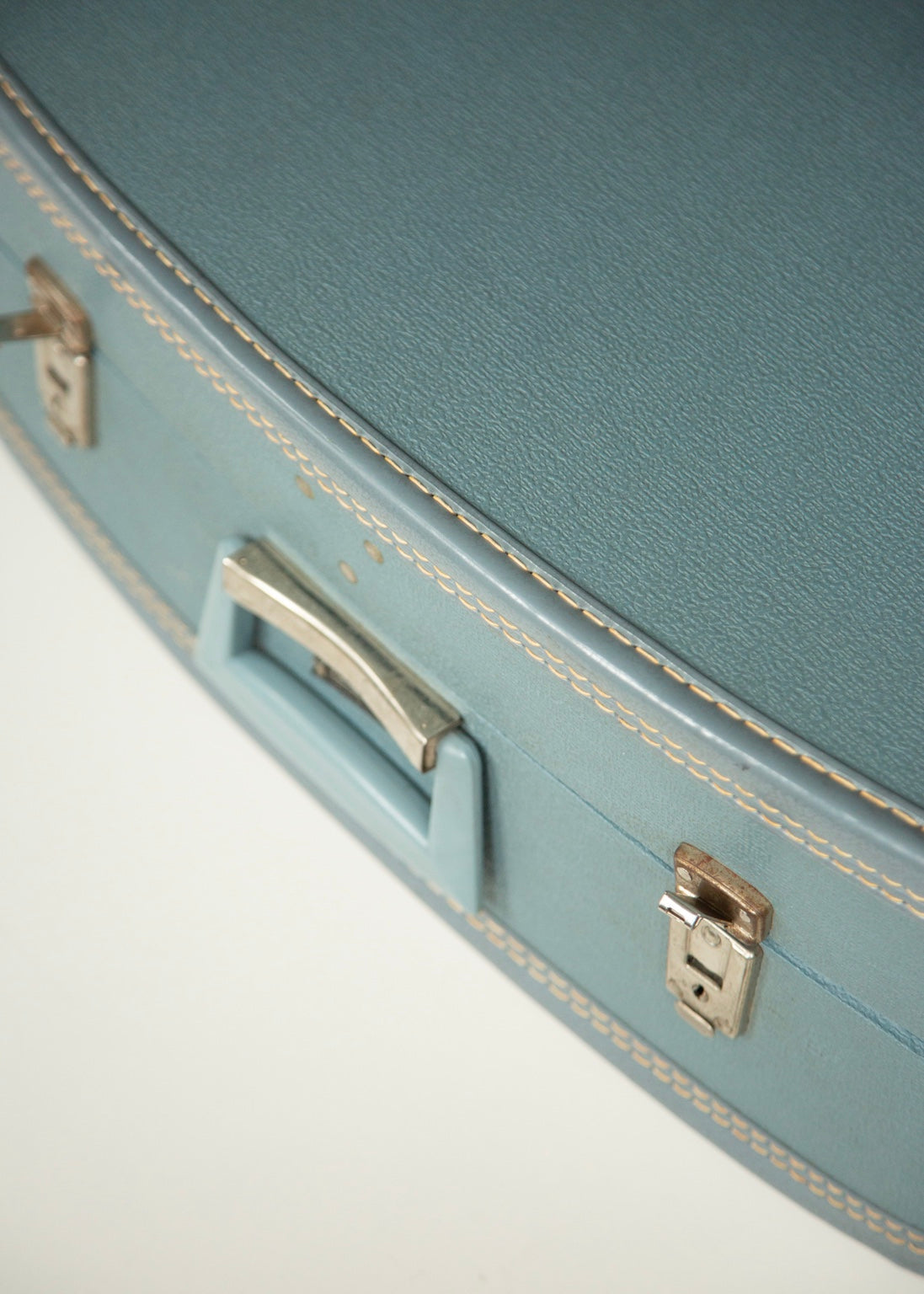 Vintage blue luggage exterior detail