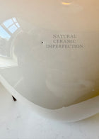 Close-up of minor natural imperfection on vintage ceramic lamp base