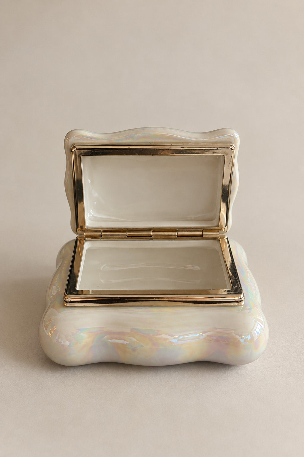 Vintage Italian iridescent jewelry box with gold-tone trim, open