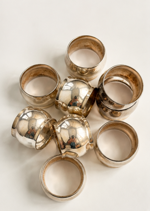 Set of seven silver-plated vintage napkin rings