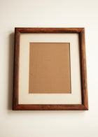 Vintage wooden picture frame with mat