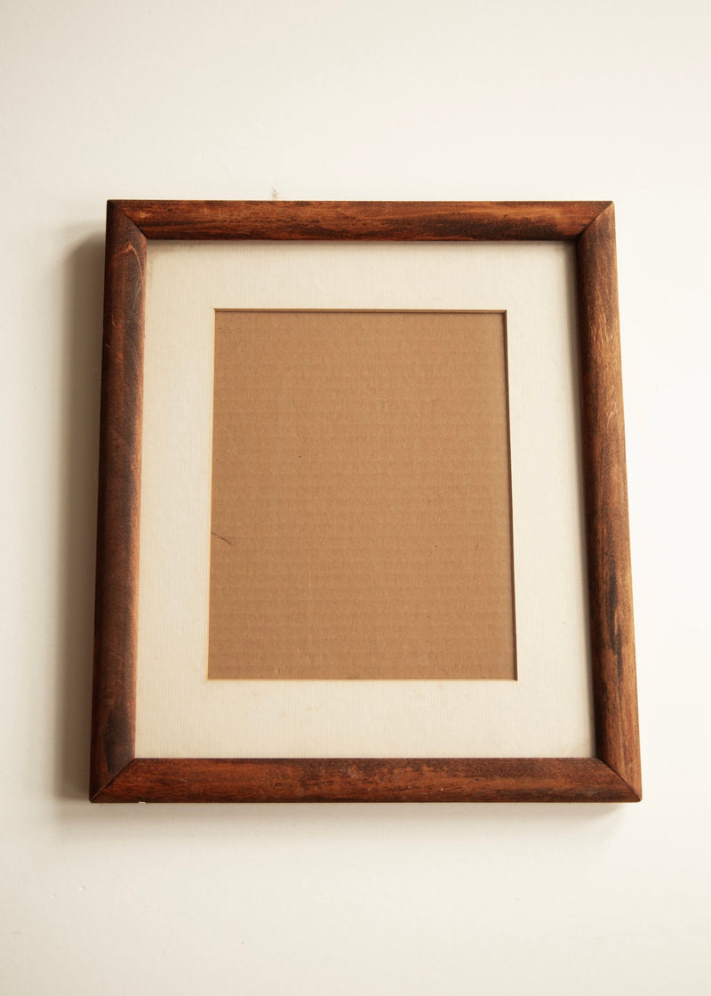Vintage wooden picture frame with mat